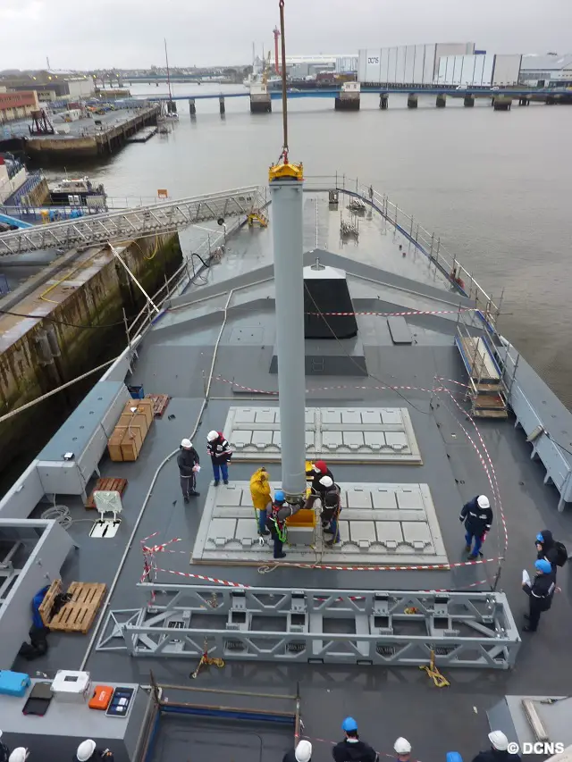 DCNS teams are seen loading a MdCN cruise missile dummy onboard French Navy FREMM Frigate Aquitaine, first ship of the class (picture: DCNS)