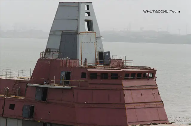 Type 055 SIF during construction (pictures from May 2014): It appears that APAR (Active Phased Array Radar) plannar arrays are only fitted on one side of the SIF (the one facing the water). These APAR antennas may be the Type 346A similar to those fitted on the existing Type 052D destroyers. Opening at the top of the mast are likely for ESM, ECM and an X band radar.
