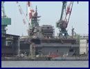 A video taken by a Japanese spotter shows the construction on Japan Maritime Self Defense Force (JMSDF) second Izumo-class Helicopter Destroyer DDH-184 is almost complete with the mast now in place. In addition, the JMSDF announced that the vessel will be named and launched in the water at the JMU Japan Marine United Corporation shipyard in Yokohama Isogo during an official ceremony on August 27.