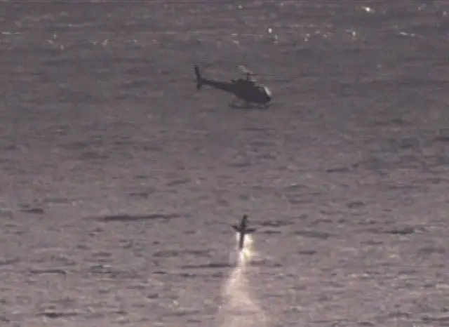 An Airbus Helicopters AS350 Écureuil (Squirrel) recovers the target (Picture: DGA)