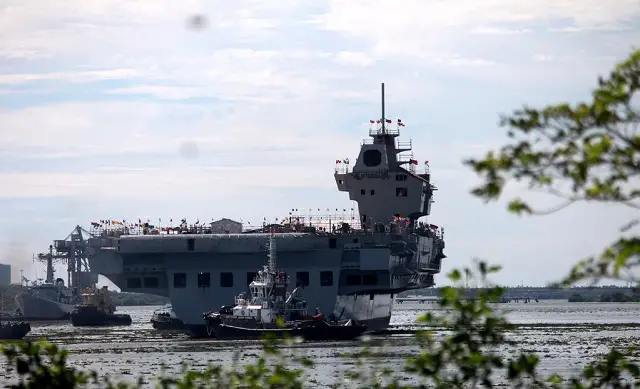 Chief of Indian Navy Reviews Progress of Indigenous Aircraft Carrier Vikrant