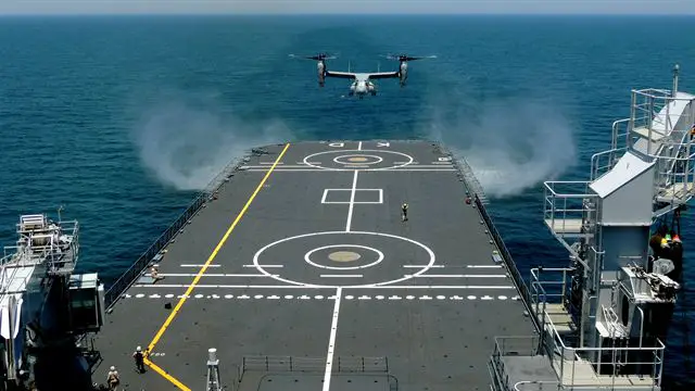 An MV-22 Osprey with Marine Medium Tiltrotor Squadron 261 prepares to land onto the Karel Doorman, a Dutch warship, during an interoperability test near Marine Corps Air Station New River, N.C., June 12, 2015. The unit worked jointly with the Royal Netherlands Navy to perform the first MV-22 Osprey carrier landing aboard a Dutch warship and strengthened the existing partnership between the two countries. Picture: USMC