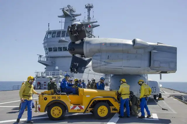 The French Navy (Marine Nationale) announced that it took another step in the interoperability between the V-22 Osprey and the Mistral-class LHD Dixmude on May 2nd 2016. While V-22s have been tested with the Mistral class several times to date (they were even officially qualified with the Mistral-class last year) it is the first time that the Bell-Boeing tilt-rotor aircraft was qualified for "blades and wings folding and long time parking" aboard the French Navy LHD.