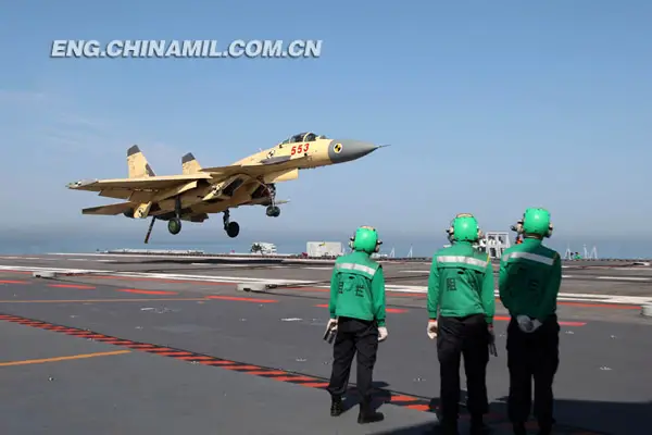 Multiple batches of ship-borne J-15 fighters conducted take-off and landing training on China’s first aircraft carrier “Liaoning Ship”, which was first launched for scientific research experiments and training this year, on June 19, 2013 in a sea area of the Bohai Sea. This is another take-off and landing training by ship-borne J-15 fighters on the “Liaoning Ship” after the J-15 fighters successfully landed on and took off from the deck of the aircraft carrier for the first time in November 2012.