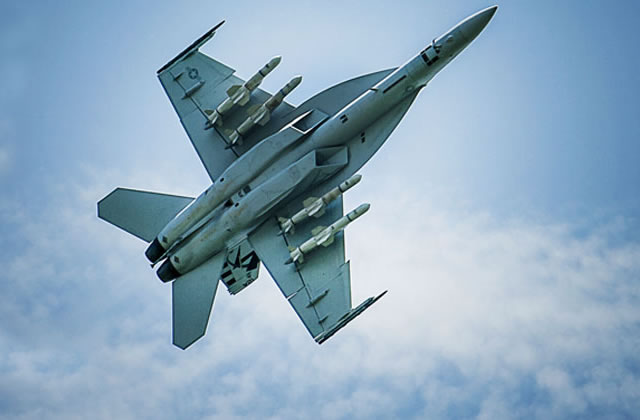 An F/A-18F Super Hornet from U.S. Navy Strike Test VX-23 in flight with four Boeing built Harpoon anti-ship missiles under its wings. Picture: Boeing
