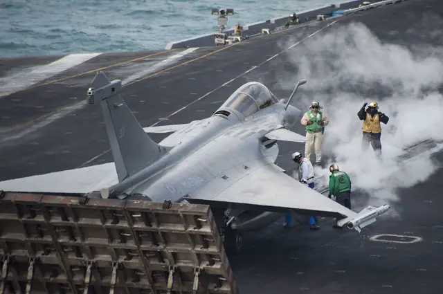 A Rafale M aircraft, assigned to the French aircraft carrier Charles de Gaulle, prepares to launch from the aircraft carrier USS Harry S. Truman (CVN 75) during carrier qualification integration.