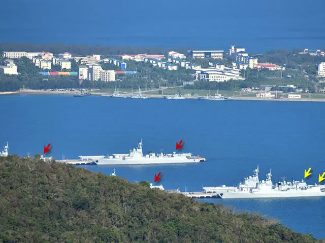 Recent picture (July 2015) showing 3x Type 052D and 2x Type 052C Destroyers moored at Yulin Naval Base on Hainan island. The red arrows point at the HQ-10 type missile based CIWS (similar to RAM) fitted on Type 052D, while the yellow arrows point to the H/PJ-12 canon based CIWS fitted on Type 052C.