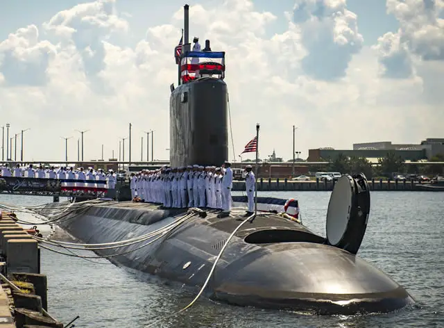 The Virginia-class attack submarine USS John Warner (SSN 785) was commissioned during a ceremony attended by more than 2,500 in its future homeport of Naval Station Norfolk, Aug. 1, 2015. Proudly displaying its motto "On a Mission to Defend Freedom," the ship is the 12th Virginia-class attack submarine to join the Navy's operating fleet. 