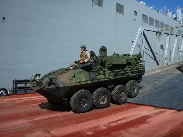 During offload operations held as part of the Initial Operational Test and Evaluation (IOT&E) end-to-end event, a Light Armored Vehicle-Logistics (LAV-L) completes its transit off of the VTR.