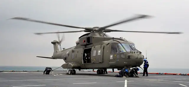 A Merlin Mk3 helicopter which was recently transfered from the RAF to the RN is seen operating at sea for the first time during trials on board RFA Lyme Bay LSD. Picture: Royal Navy 