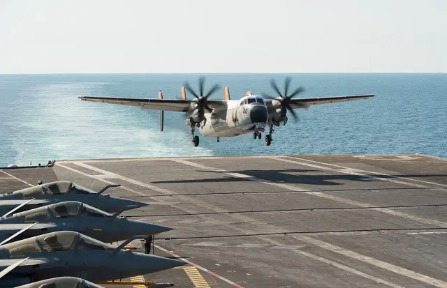 A US Navy C-2A Greyhound carrier on-board delivery (COD) aircraft from fleet logistic support squadron VRC-40 "Rawhides" about to perform a "touch and go" with French Navy aircraft carrier Charles de Gaulle. The French CVN is currently deployed in the Gulf in support of coalition operations against Daesh.