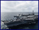 The John C. Stennis Strike Group (JCSSG) is conducting routine operations in the South China Sea. The ships transited the Luzon Strait March 1 and have maintained a location in the eastern half of these international waters for four days. USS John C. Stennis (CVN 74), USS Chung-Hoon (DDG 93), USS Stockdale (DDG 106) and USS Mobile Bay (CG 53) all conducted a replenishment at sea March 4, receiving advanced biofuel, aviation fuel and supplies from USNS Rainier (T-AOE 7). Flight operations have occurred daily with Carrier Airwing (CVW) 9 conducting 266 sorties. 