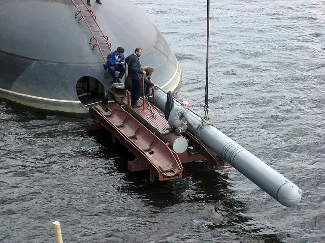 Loading of a Kalibr cruise missile aboard a Kilo-class submarine