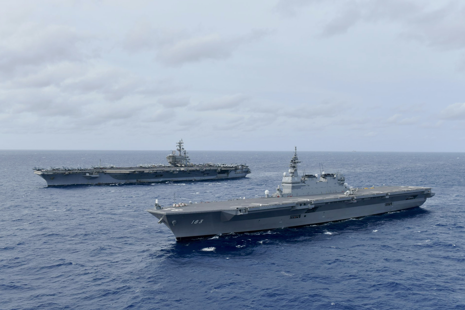 USS Ronald Reagan and JS Izumo sail together in the South China Sea