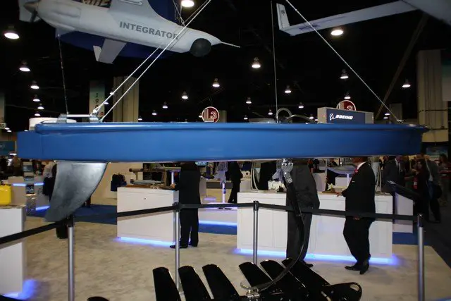 At Sea-Air-Space 2015, Boeing and its partner Liquid Robotics are showcasing a new solution for maritime security that enables continuous monitoring and communications solutions from seafloor to space, the Sensor Hosting Autonomous Remote Craft (SHARC). The SHARCs is based on Liquid Robotics' Wave Glider SV3, a unique wave and solar propelled 2 parts system (one on the surface, the other under water). 